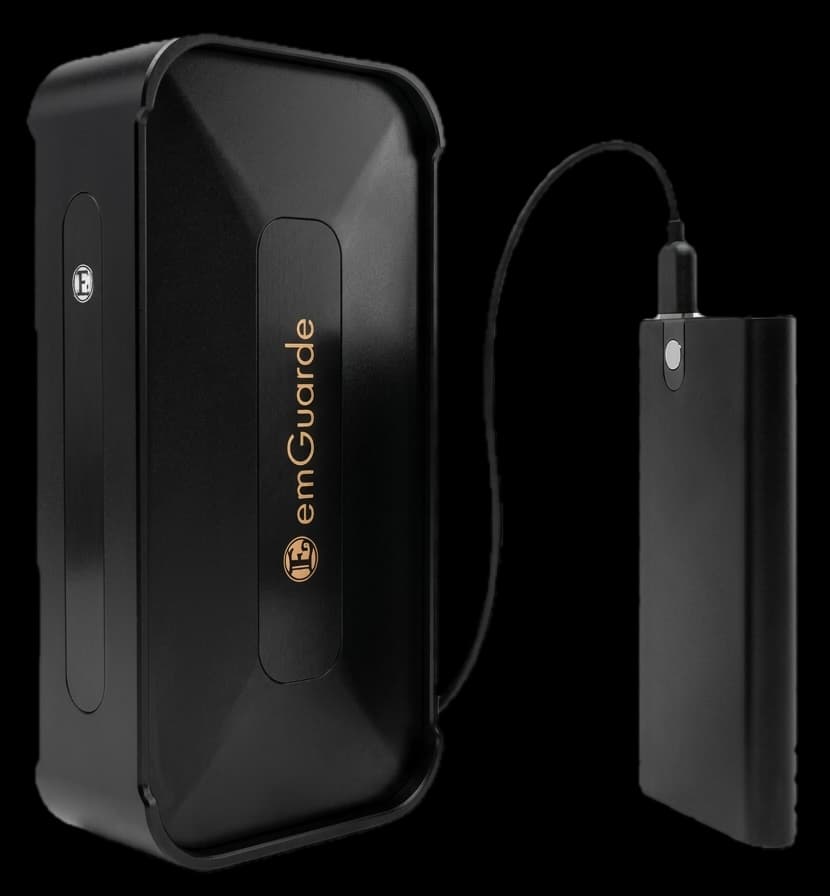 emGuarde plugged into a portable power bank — works anywhere